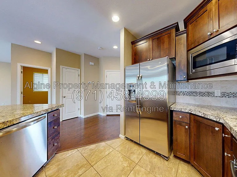 9495 NW Ember Ln — Photo 21