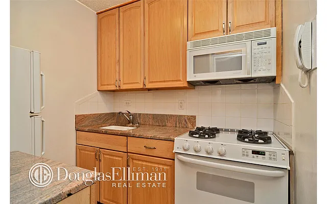 Sold by Douglas Elliman | media 29