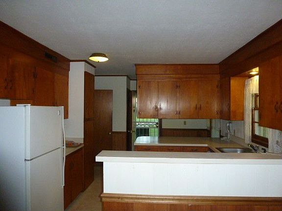 View of kitchen from den