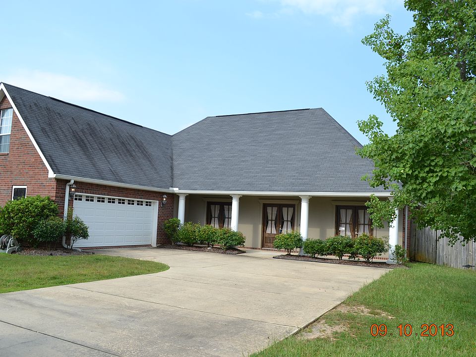 Frech country wood doors across front