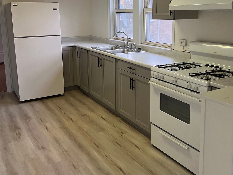 New cabinets, countertop and floor.