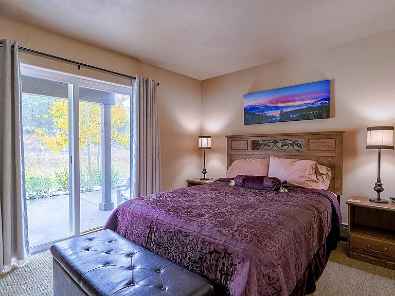 First floor bedroom with outside patio