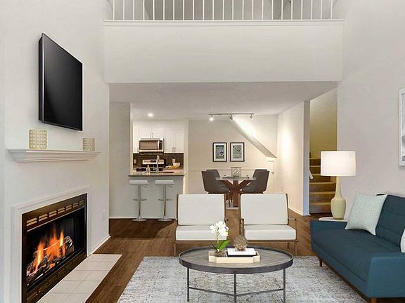 Finish Package II kitchen, living, and dining areas with hard surface flooring