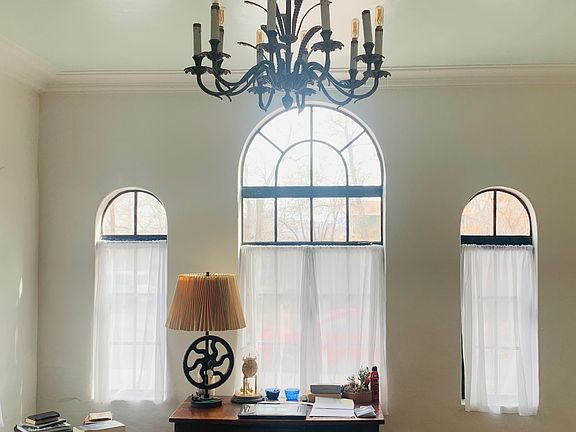 high ceilings with period chandelier