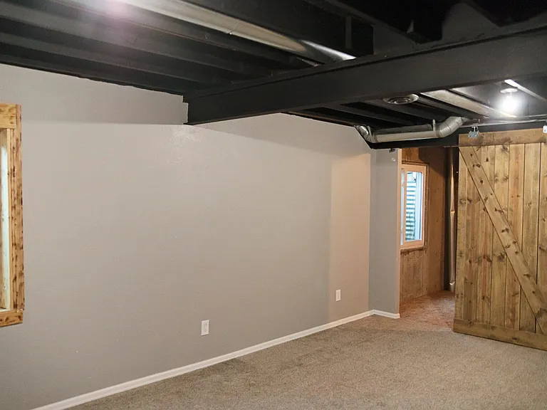 Basement with unfinished storage space