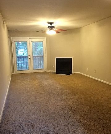 Spacious living room/ wood burning fireplace