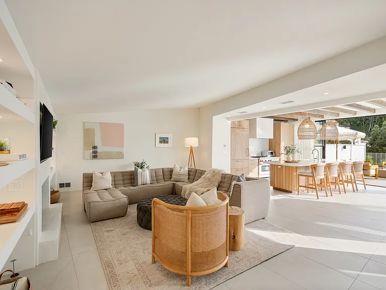 Feel at home in a living room that radiates calm and charm.