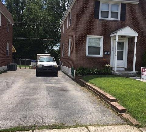Driveway 2-3 cars piggy backed.