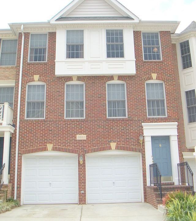 BRICK FRONT 3BR,2.5,2 CAR GAR & IS FILLED W/DESIGNER FINISHES