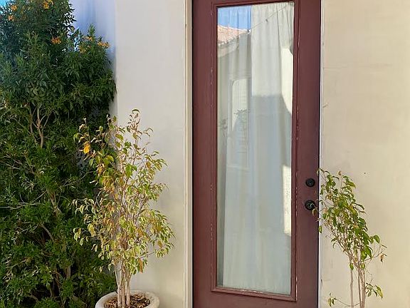 Detached casita separate keyed front door located off shared courtyard.