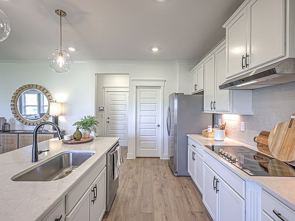 Photo of example Model Home. Selections and finishes may vary.