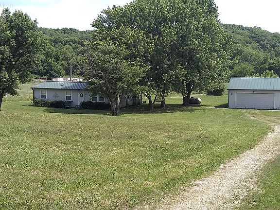  top of driveway, facing S.