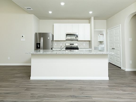 Dining Area to Kitchen