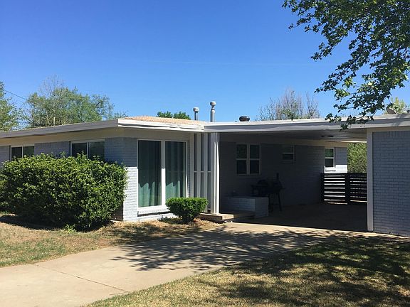 MID-CENTURY CARPORT WITH EASY ACCESS