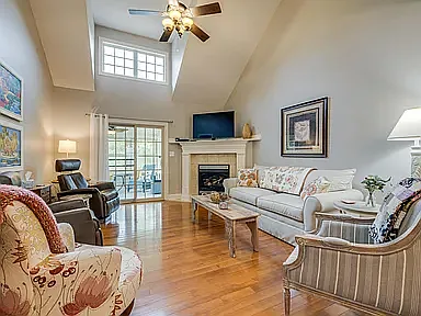 Living Room with Sliding Glass Doors to Sunroom