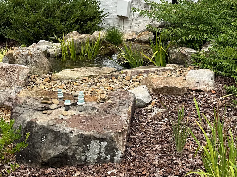 Water feature on east side of house, to the rear