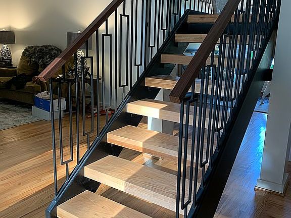 New open riser steel stair