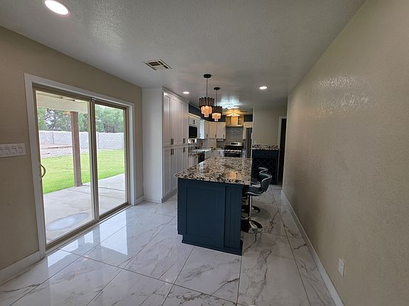 5th image of 8763 E 26th Pl