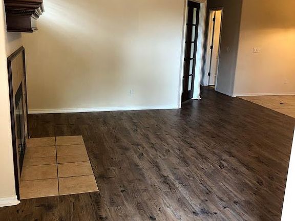 Entry to living room with laminate floors