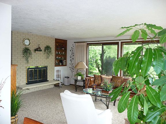Light & Bright Living Room with new carpeting.