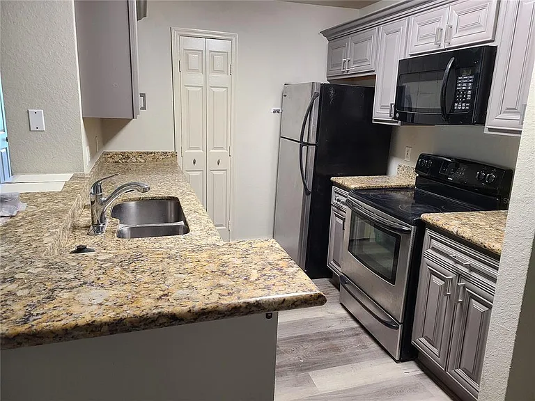 8911 Manor Loop #205 — Photo 3
