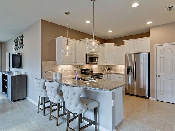 Conceptual Kitchen with granite counters and stainless steel appliances