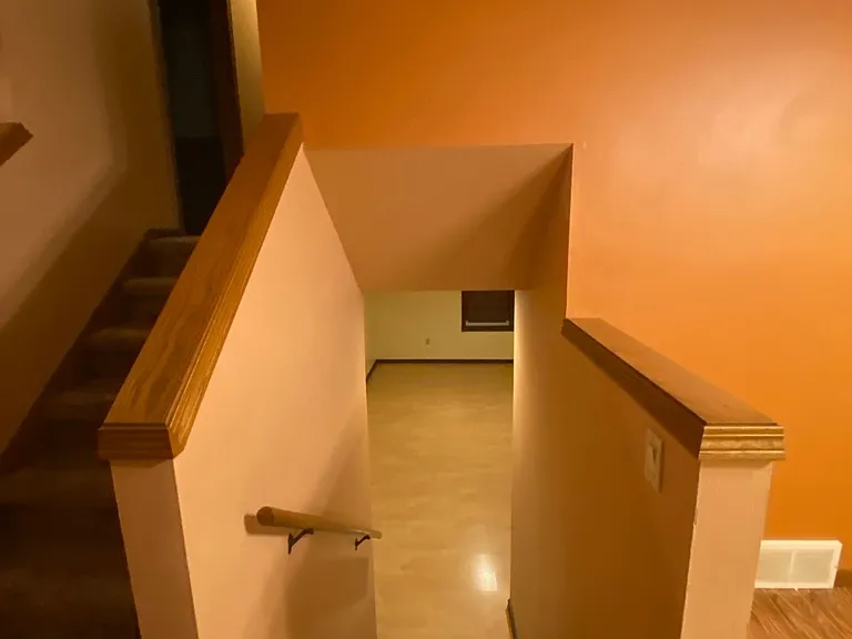 Downstairs to second living space which can be converted to an office or 4th bedroom