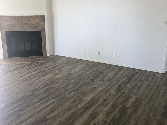 Living Room with Wood Burning Fireplace