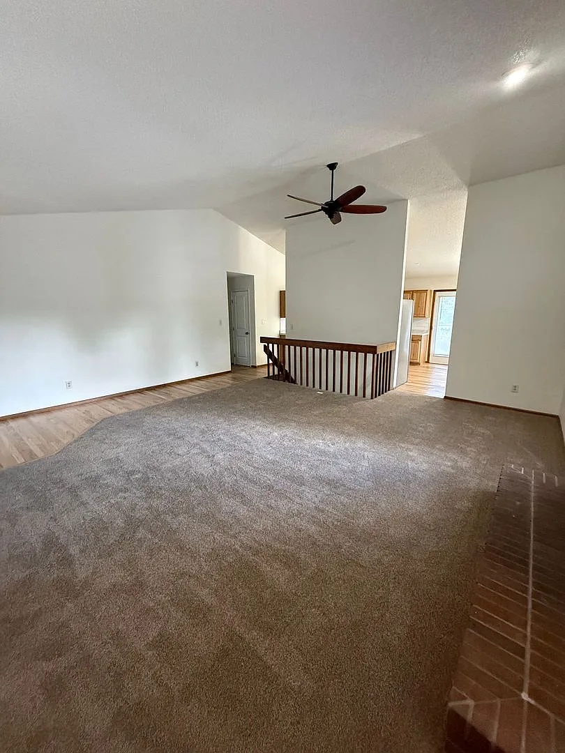 Beautifully Updated 5 Bedroom Rockrimmon Ranch Home Backing to Open Space — Photo 4