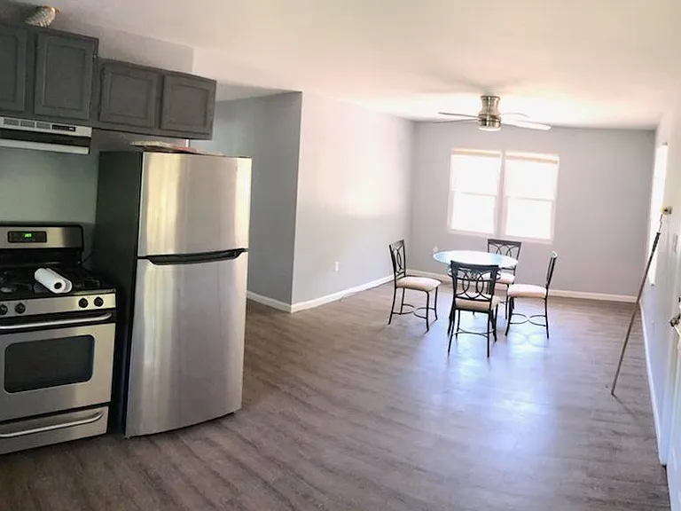 Kitchen and dining room (entrance at right)