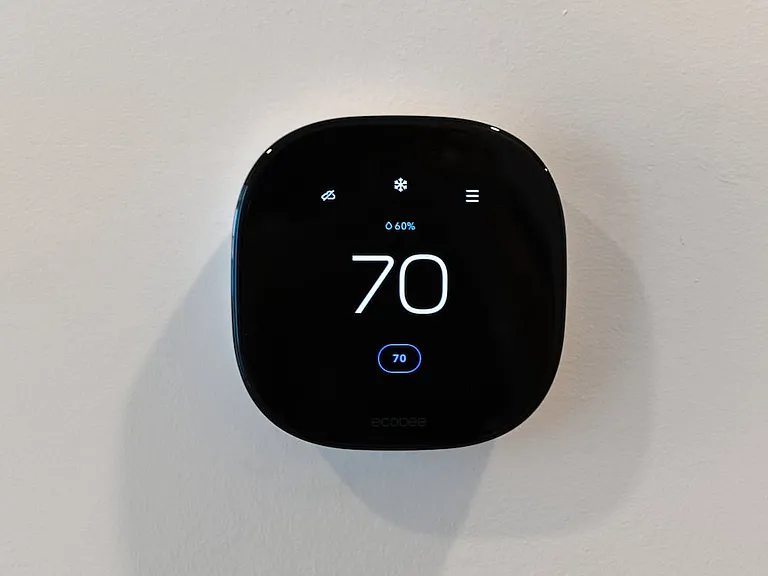 Smart home technology including programmable thermostat