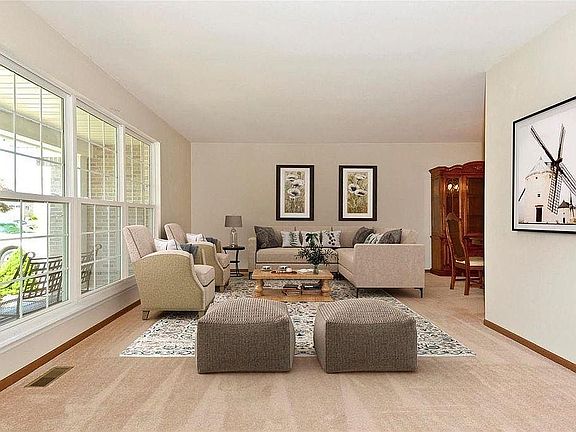 on sunny days, this room beams in brightness, around the corner is the formal dining space