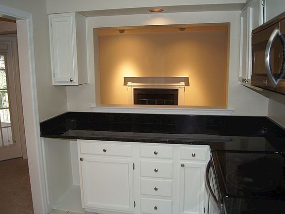 Kitchen opens to den/family room