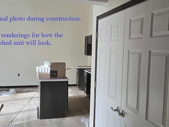 Actual photo during construction. See renderings for how the finished unit will look