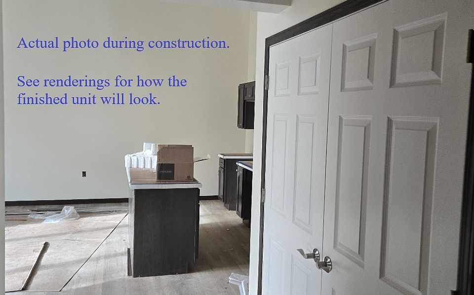 Actual photo during construction. See renderings for how the finished unit will look