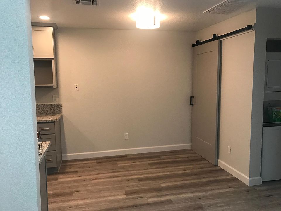 Dining area with barn door kitchen pantry