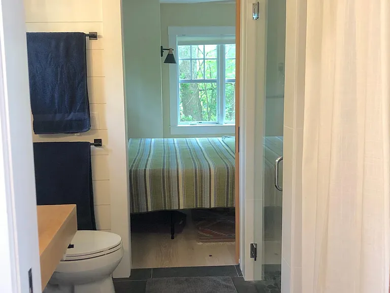 view through bath to first floor bedroom