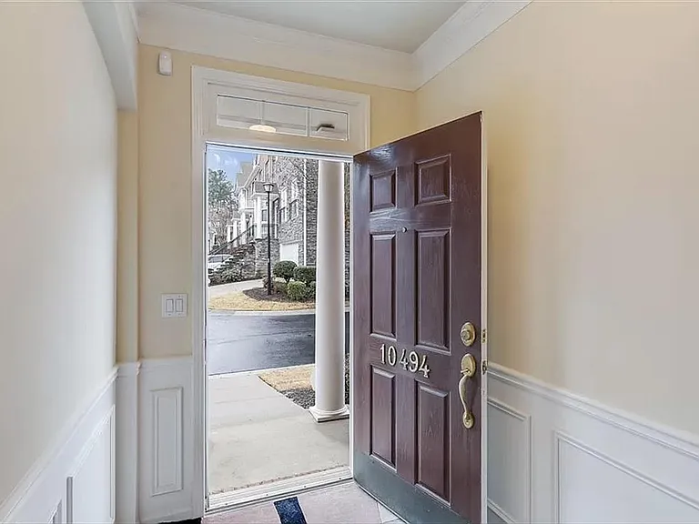 Front door entrance with hardwood spacious foyer