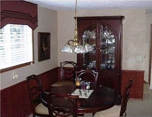 Informal dining right off kitchen.
