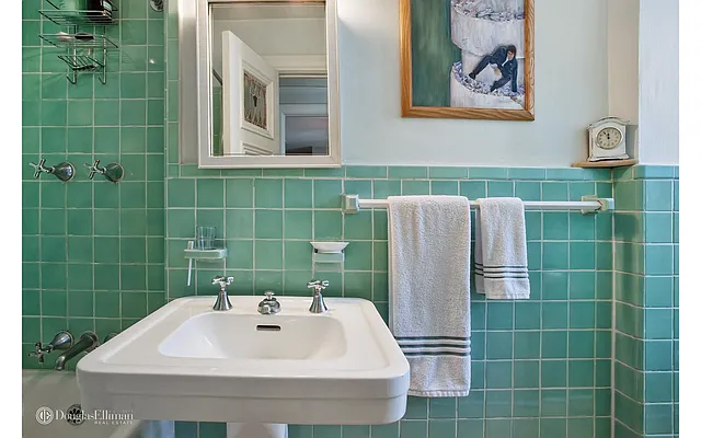 Sold by Douglas Elliman | media 10