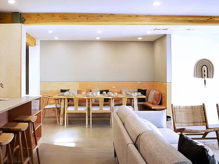 Open-concept living and dining area with seating for large groups.