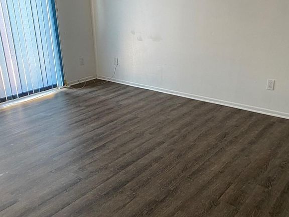 New textured vinyl flooring throughout...