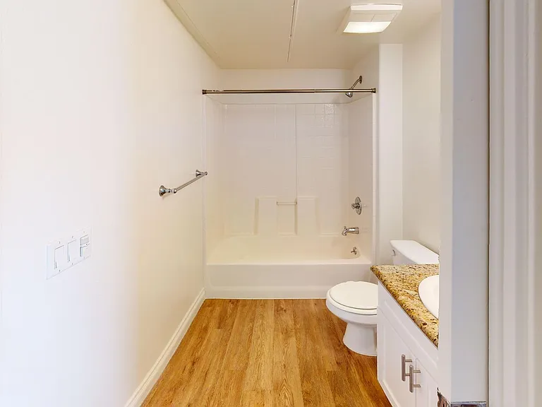 VNT - The Village Apartments — Photo 11
