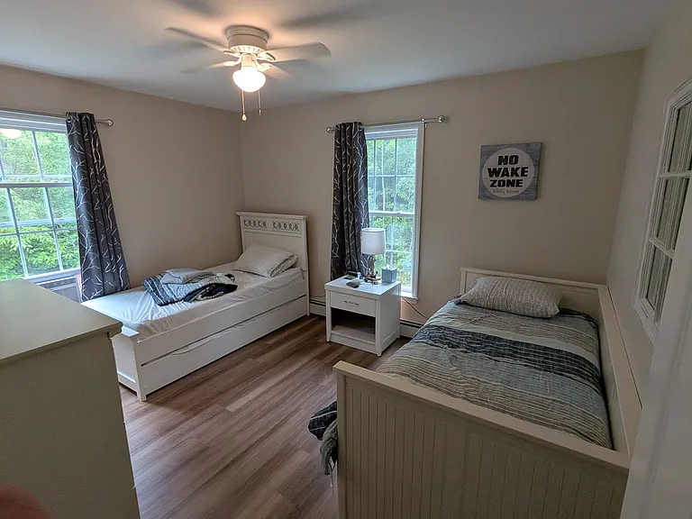 Two twins, one with pull-out twin trundle underneath.