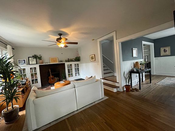 Spacious living room with built-ins