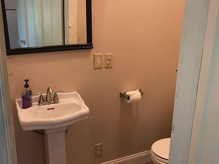 1st floor 1/2 bath off kitchen