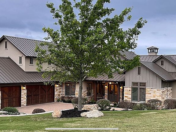 Two Red Oak trees in front
