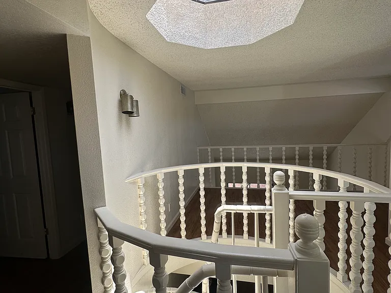 Spital staircase landing to loft & skylight