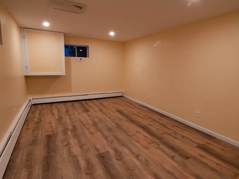Lower level heated, insulated, ventilated office and retreat space with windows.