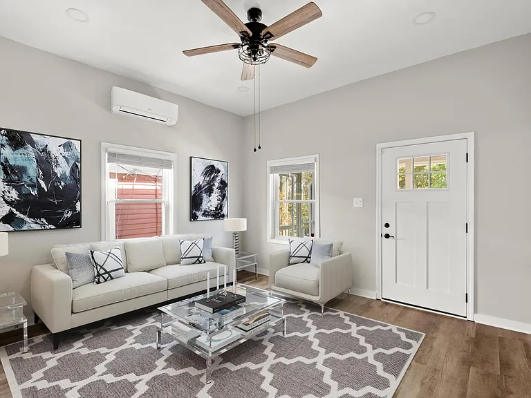 The furniture and decor in this image are virtual representations, intended to provide a visual example of the property's possibilities
